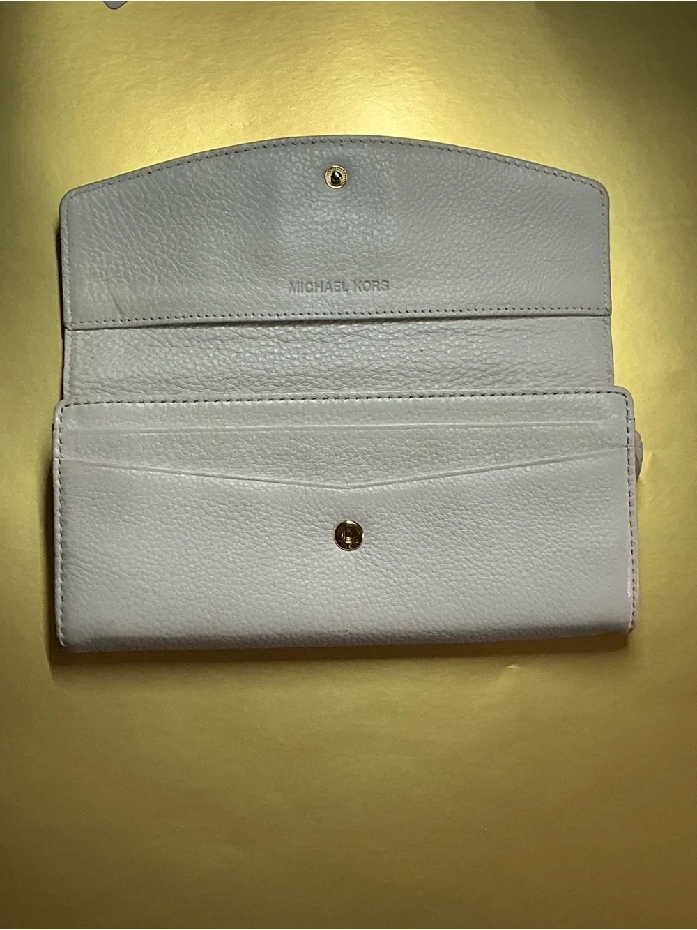 Michael Kors previously owned